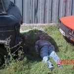 Dead homeless man found between two cars