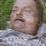 Dead homeless man found between two cars