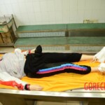 Examination of dead Chinese woman