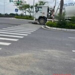Middle-aged woman has her lower part crushed by concrete truck