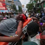 Street vendor shot dead by police officer during protest