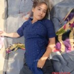 Woman found strangled and stuffed into suitcase