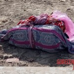 Woman found strangled and stuffed into suitcase