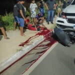 Young man on motorcycle hit and dragged by car