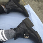 Dead young woman found in parking lot of furniture store