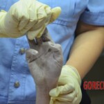 Drowned young Chinese woman pulled from river