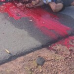 Executed by shotgun blast on street in broad daylight