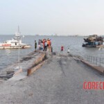 Dead woman pulled from submerged car