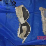 Dead woman pulled from submerged car