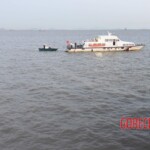 Dead woman pulled from submerged car