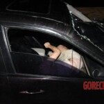 Dead woman pulled from submerged car