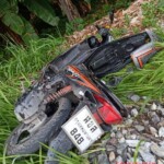 Scooter rider fatally hit by train