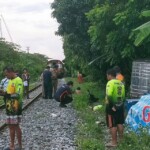 Scooter rider fatally hit by train