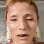 Unidentified woman found dead on sidewalk