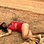 Dead body of woman found dumped next to dirt road