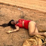 Dead body of woman found dumped next to dirt road