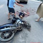 Motorcyclist crashes into truck at intersection