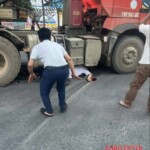 Guy on electric bicycle crushed by truck