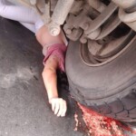 Female biker crushed by heavy truck