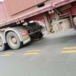 Female biker crushed by heavy truck