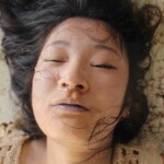 Chinese woman drowned in flooded river