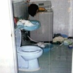 Naked body of young woman found stuffed in washing machine