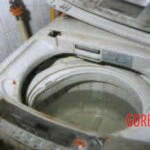 Naked body of young woman found stuffed in washing machine