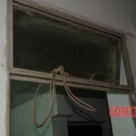 Young Chinese woman hanged herself from the window frame