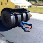 Worker crushed to death by road roller