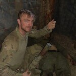 Alleged American soldiers posing with bodies of dead Russian soldiers