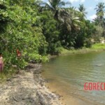 Half-naked woman found dead floating in lake