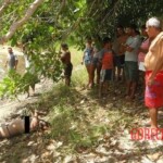 Half-naked woman found dead floating in lake