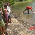 Half-naked woman found dead floating in lake