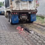 Motorcyclist crushed to death by dump truck