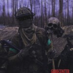 Ukrainian soldiers pose with Russian soldier's skull
