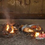 Woman burst into flames on street