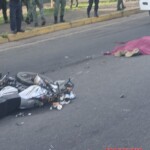 Two dead after motorcycle crashes into military truck