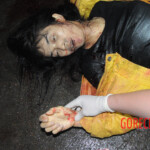 Initial examination of dead Chinese woman