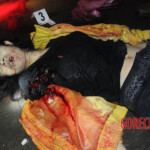Initial examination of dead Chinese woman